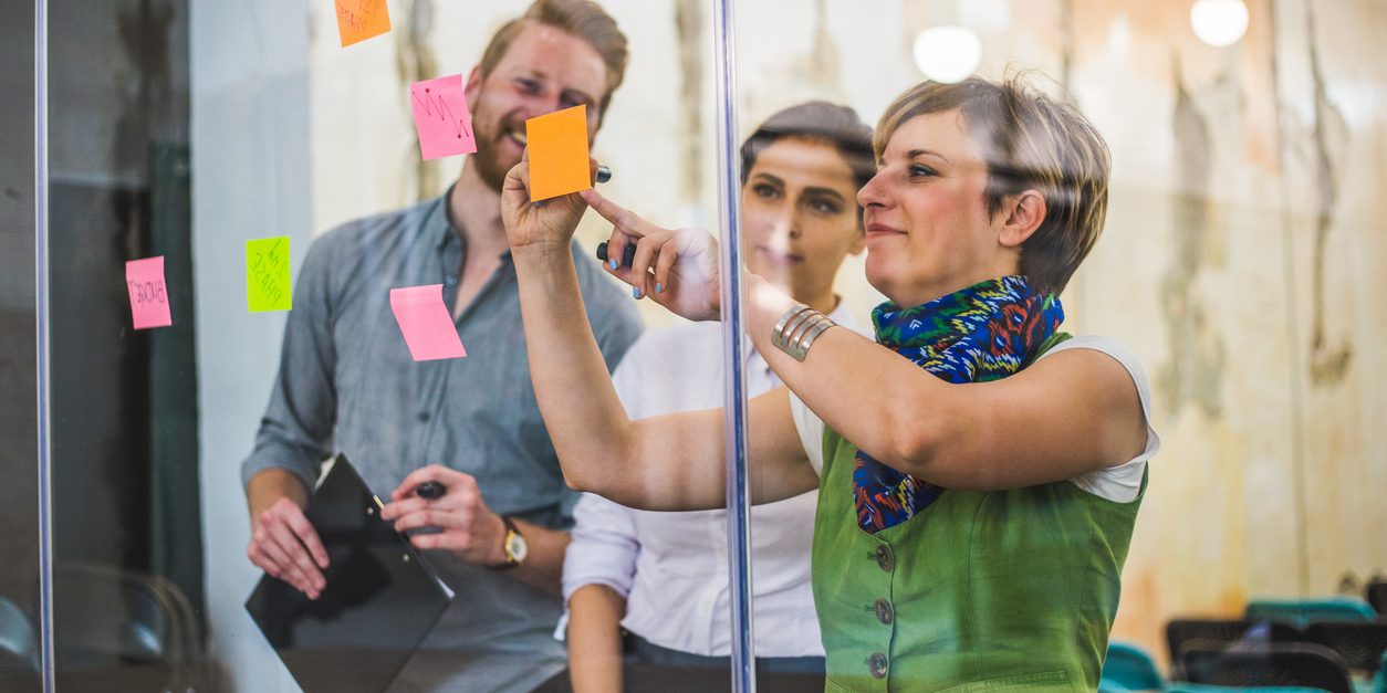 Young creative business people meeting at office